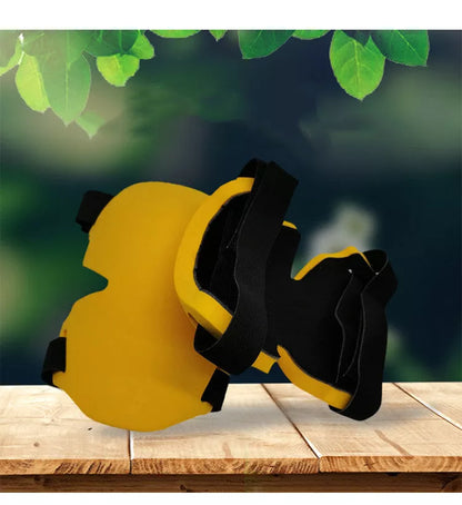 Black and yellow sports knee pads for outdoor and construction use