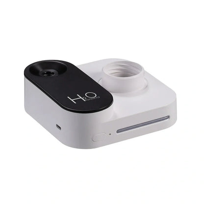 Green mineral water bottle style USB humidifier measuring 100mm with single mist outlet