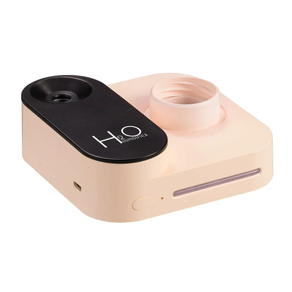 Green mineral water bottle style USB humidifier measuring 100mm with single mist outlet