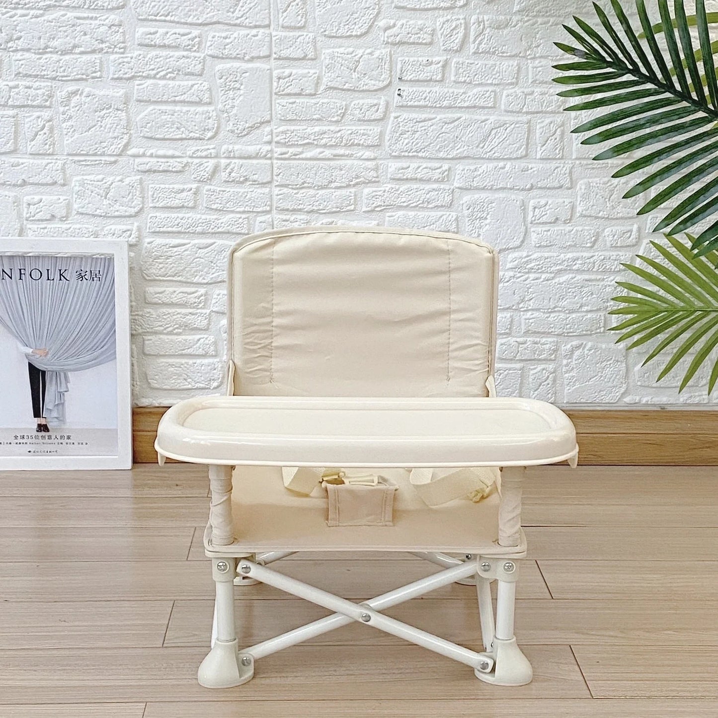 Baby folding dining chair in lake blue with metal frame and carrying bag