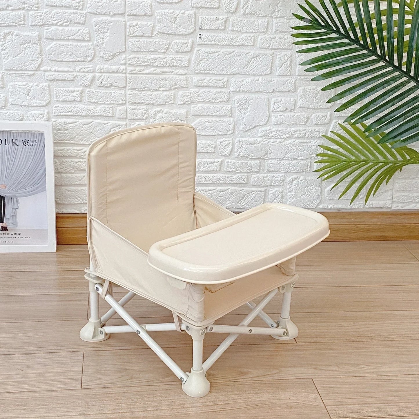 Baby folding dining chair in lake blue with metal frame and carrying bag