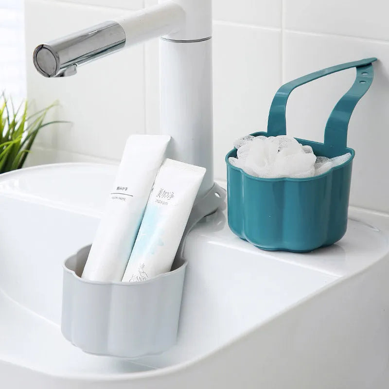 Nordic style plastic sink drain basket with draining compartment in blue, grey, or pink colour options.