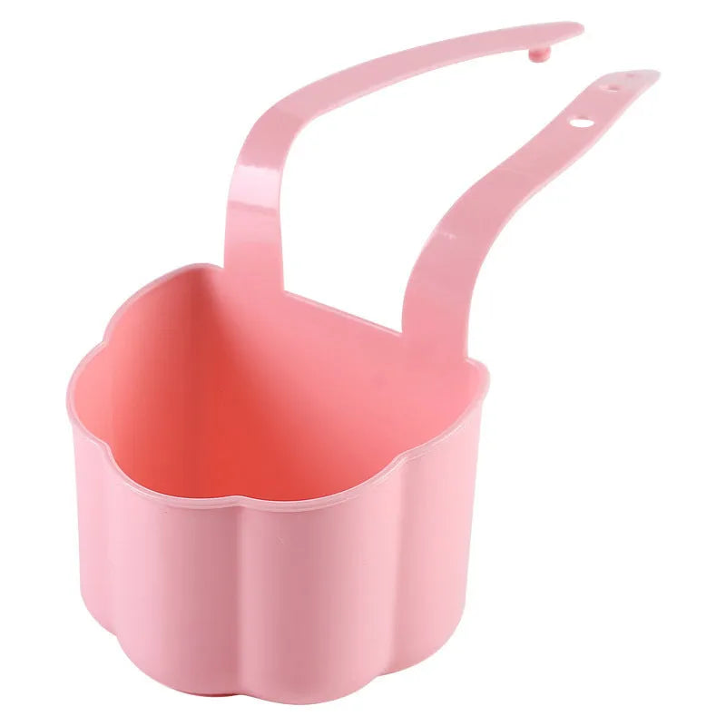 Nordic style plastic sink drain basket with draining compartment in blue, grey, or pink colour options.