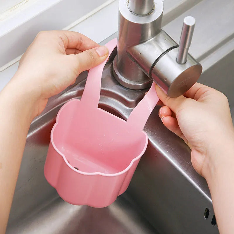 Nordic style plastic sink drain basket with draining compartment in blue, grey, or pink colour options.