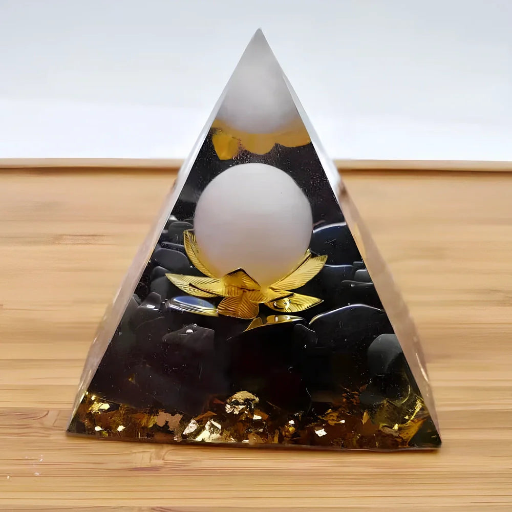 Black resin pyramid home ornament measuring 60mm with modern geometric design