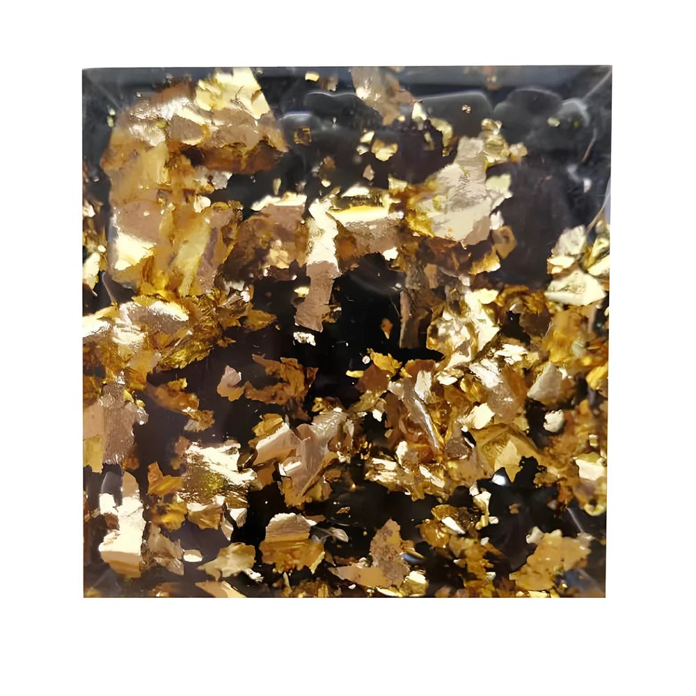 Black resin pyramid home ornament measuring 60mm with modern geometric design