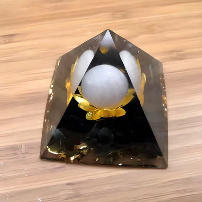 Black resin pyramid home ornament measuring 60mm with modern geometric design