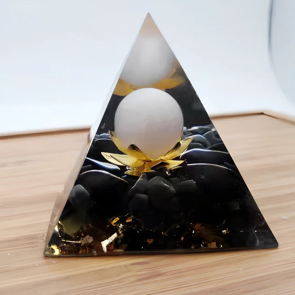 Black resin pyramid home ornament measuring 60mm with modern geometric design