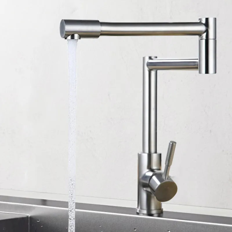 Silver stainless steel kitchen faucet with a single lever and 360-degree rotating spout on a sink.