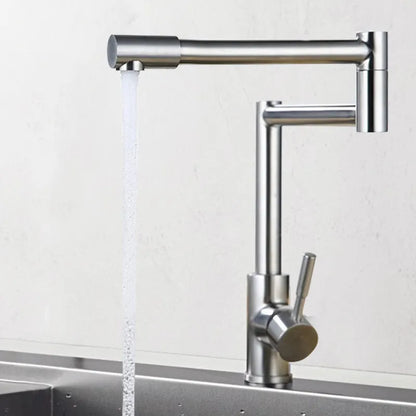 Silver stainless steel kitchen faucet with a single lever and 360-degree rotating spout on a sink.