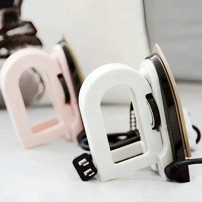 Compact white or pink 220V electric iron, 20cm long, for home clothing wrinkle removal