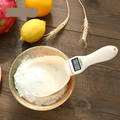 Beige digital spoon scale with detachable spoon, LED display, and four measuring units g ml cup oz