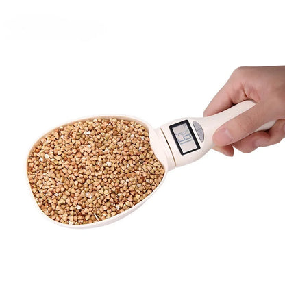 Beige digital spoon scale with detachable spoon, LED display, and four measuring units g ml cup oz