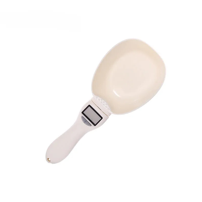 Beige digital spoon scale with detachable spoon, LED display, and four measuring units g ml cup oz