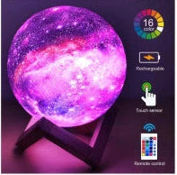 3D printed moon lamp with detailed crater surface on wooden base showing LED illumination