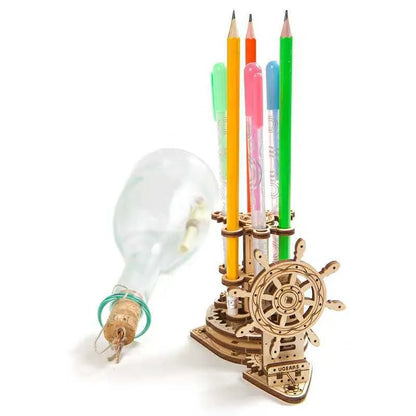 Ukrainian wooden rotating pen holder with steering wheel design on desk