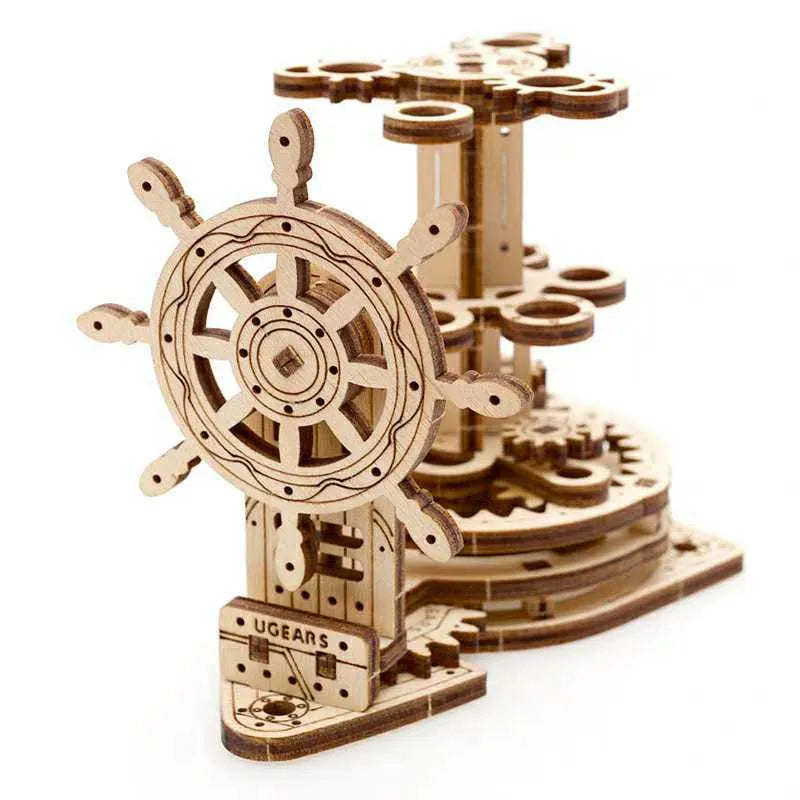 Ukrainian wooden rotating pen holder with steering wheel design on desk