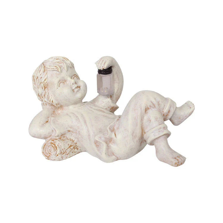 Charming solar-powered firefly garden statue with resin construction and automatic nighttime lighting