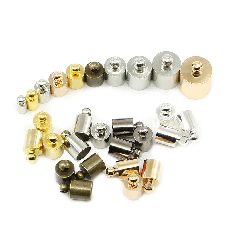 Assorted copper weight caps in gold, silver, and bronze electroplated finishes, shown in different sizes for jewellery making.