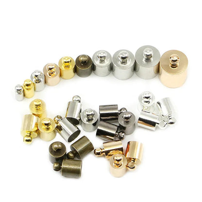 Assorted copper weight caps in gold, silver, and bronze electroplated finishes, shown in different sizes for jewellery making.