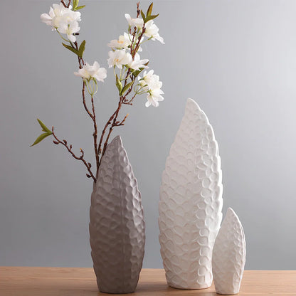 White ceramic flower vase with matte finish in Nordic design style