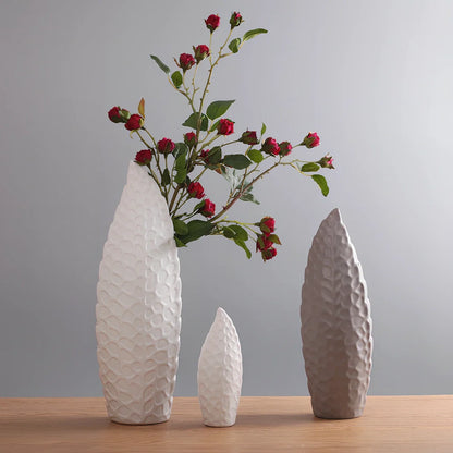 White ceramic flower vase with matte finish in Nordic design style