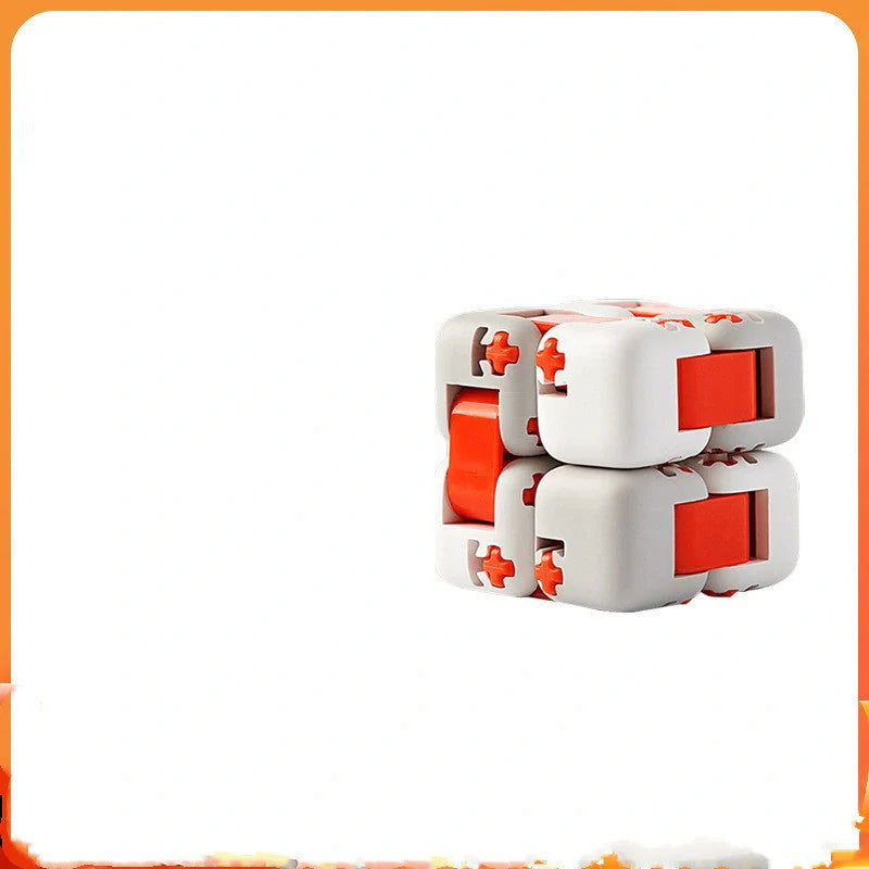 Mitu fidget building block toy in white, gray, and orange with zero draft technology for stress relief