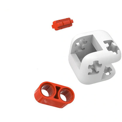 Mitu fidget building block toy in white, gray, and orange with zero draft technology for stress relief