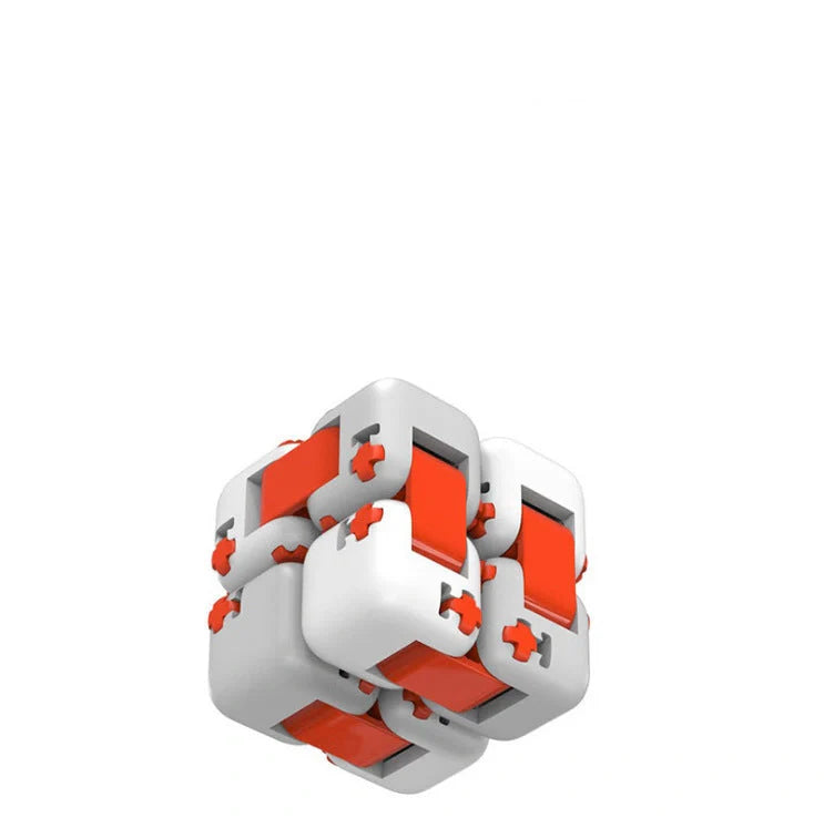 Mitu fidget building block toy in white, gray, and orange with zero draft technology for stress relief