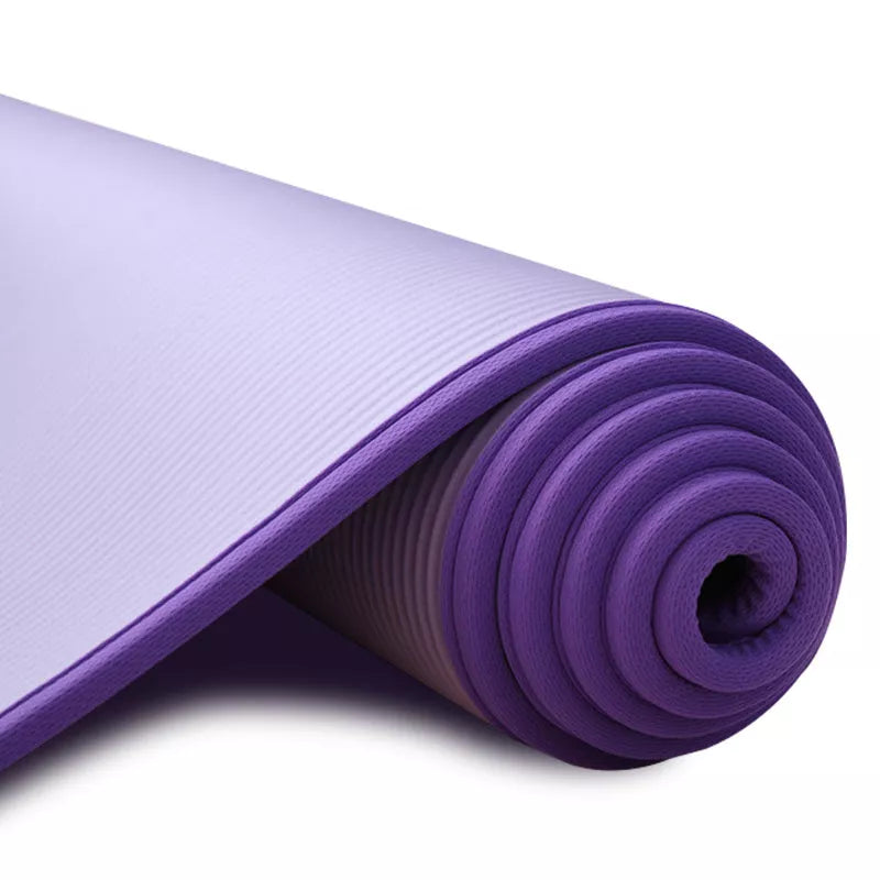 Extra thick non-slip yoga mat in black, blue, pink, or purple, ideal for beginners and professionals