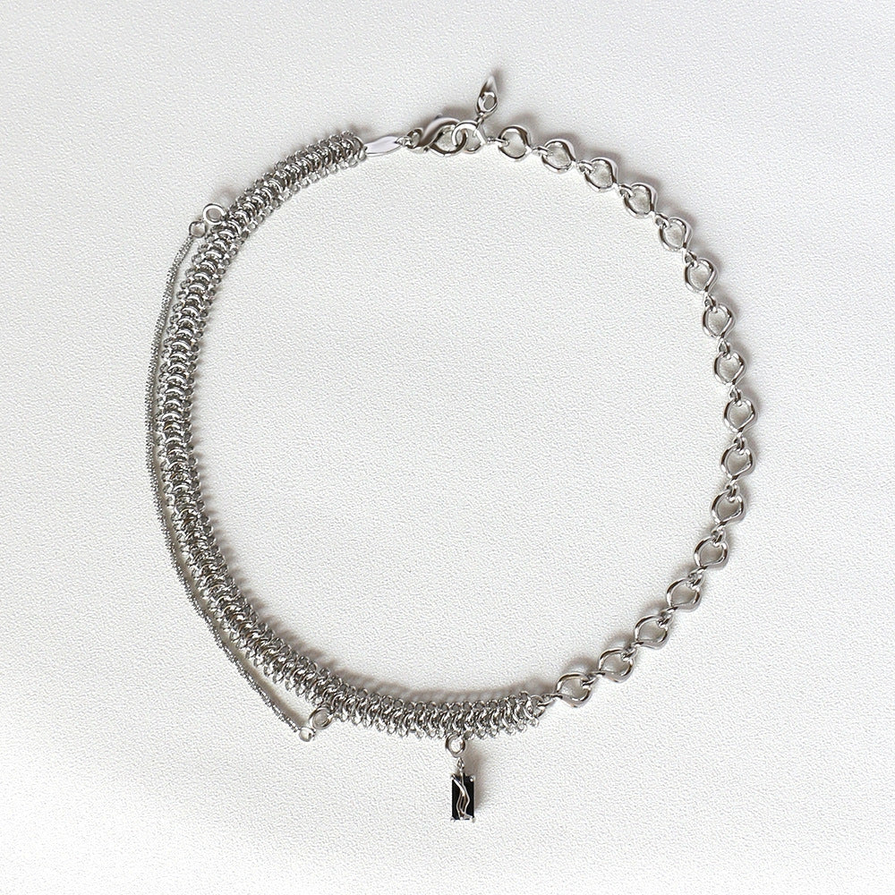 Elegant Clavicle Chain Necklace in silver color, featuring a delicate and sophisticated design with a pendant and chain made of premium copper and platinum plating