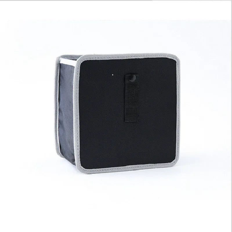 Hanging car trash can in Oxford cloth, 22x22x14.5cm, shown in grey, black, red, and green colour options.