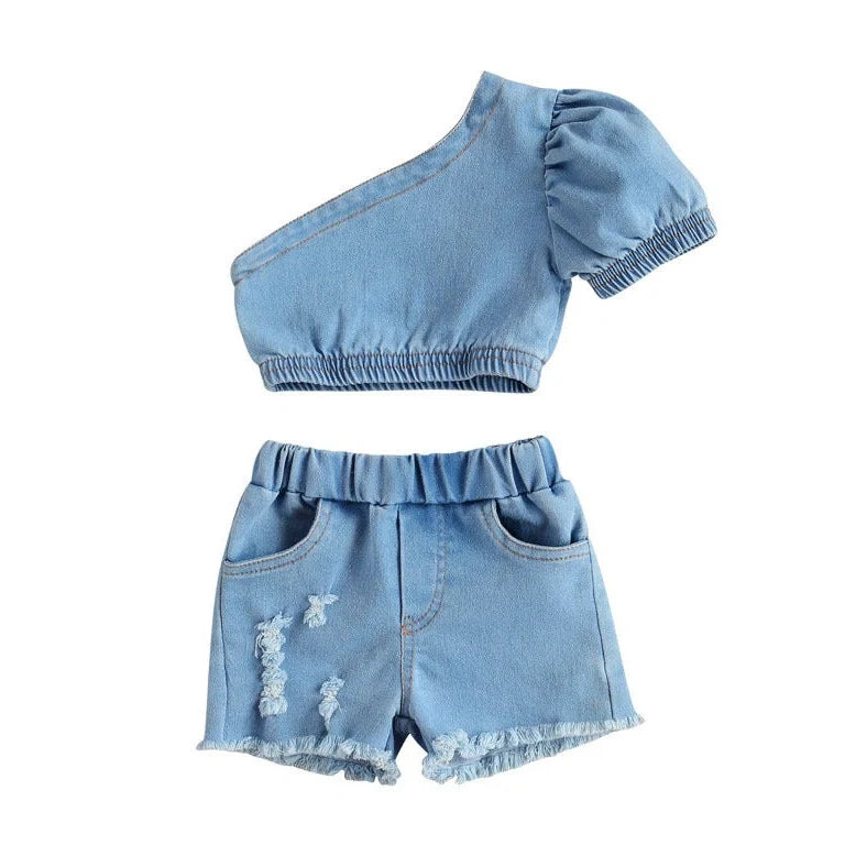 Girls' sky blue two-piece dress set with matching shorts, size chart showing measurements for ages 6 months to 5 years