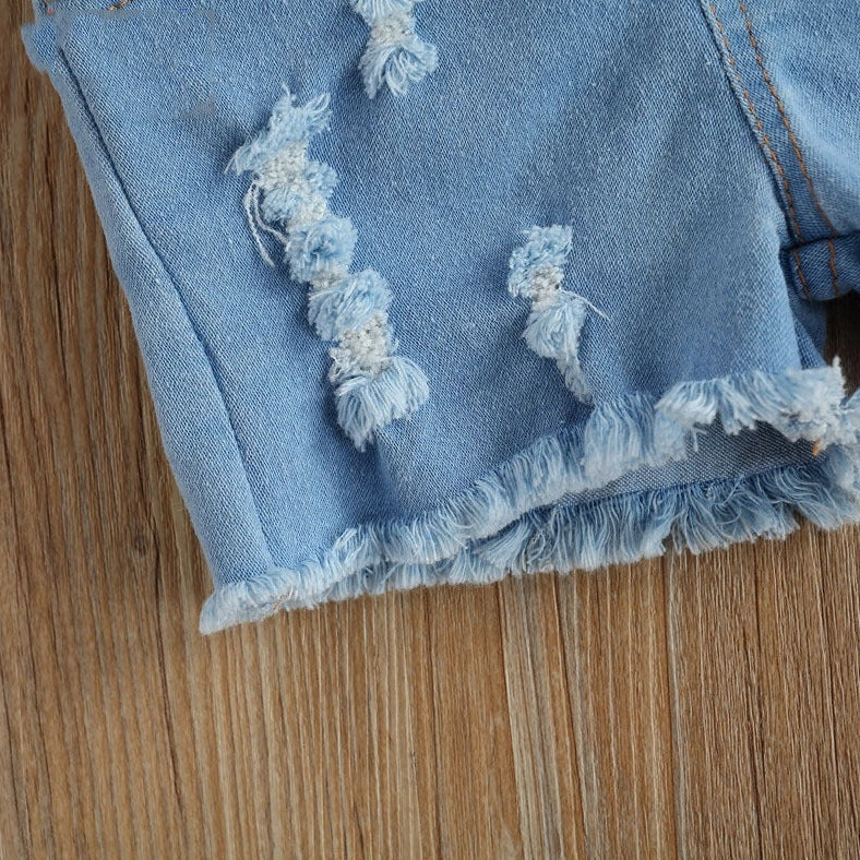 Girls' sky blue two-piece dress set with matching shorts, size chart showing measurements for ages 6 months to 5 years