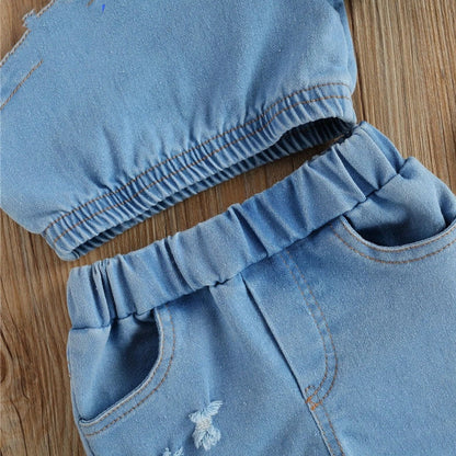 Girls' sky blue two-piece dress set with matching shorts, size chart showing measurements for ages 6 months to 5 years