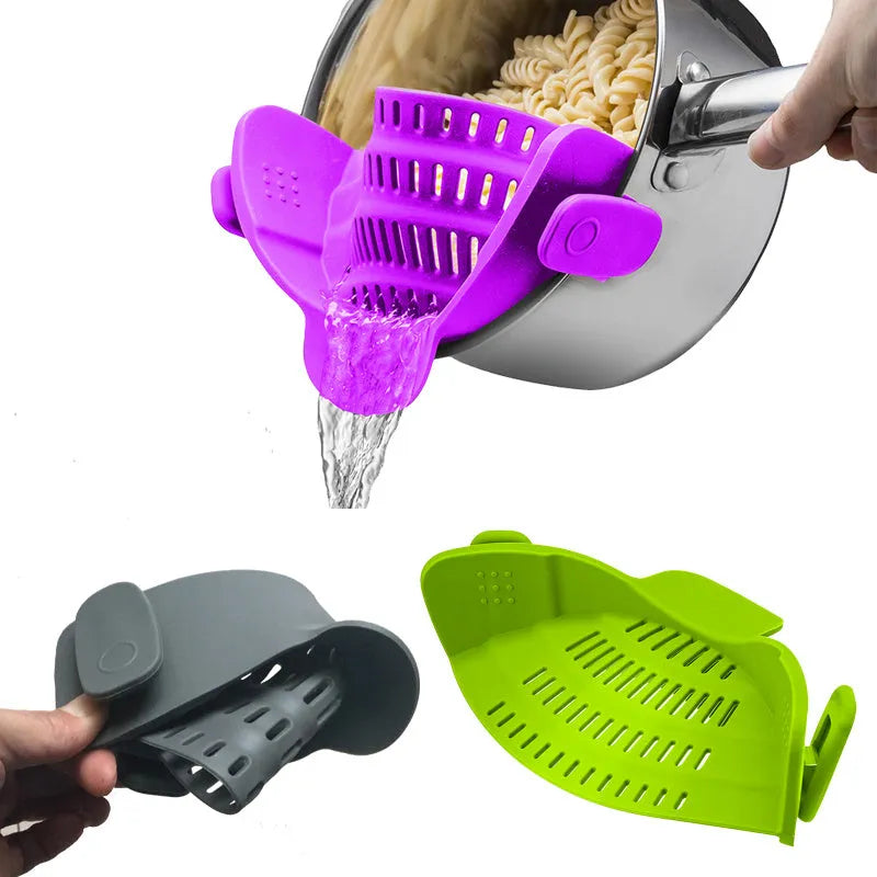 Silicone clip-on kitchen strainer with stainless steel frame attached to pot rim