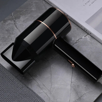 Compact black negative ion hair dryer showing 18cm length with four speed buttons and hot/cold air switch
