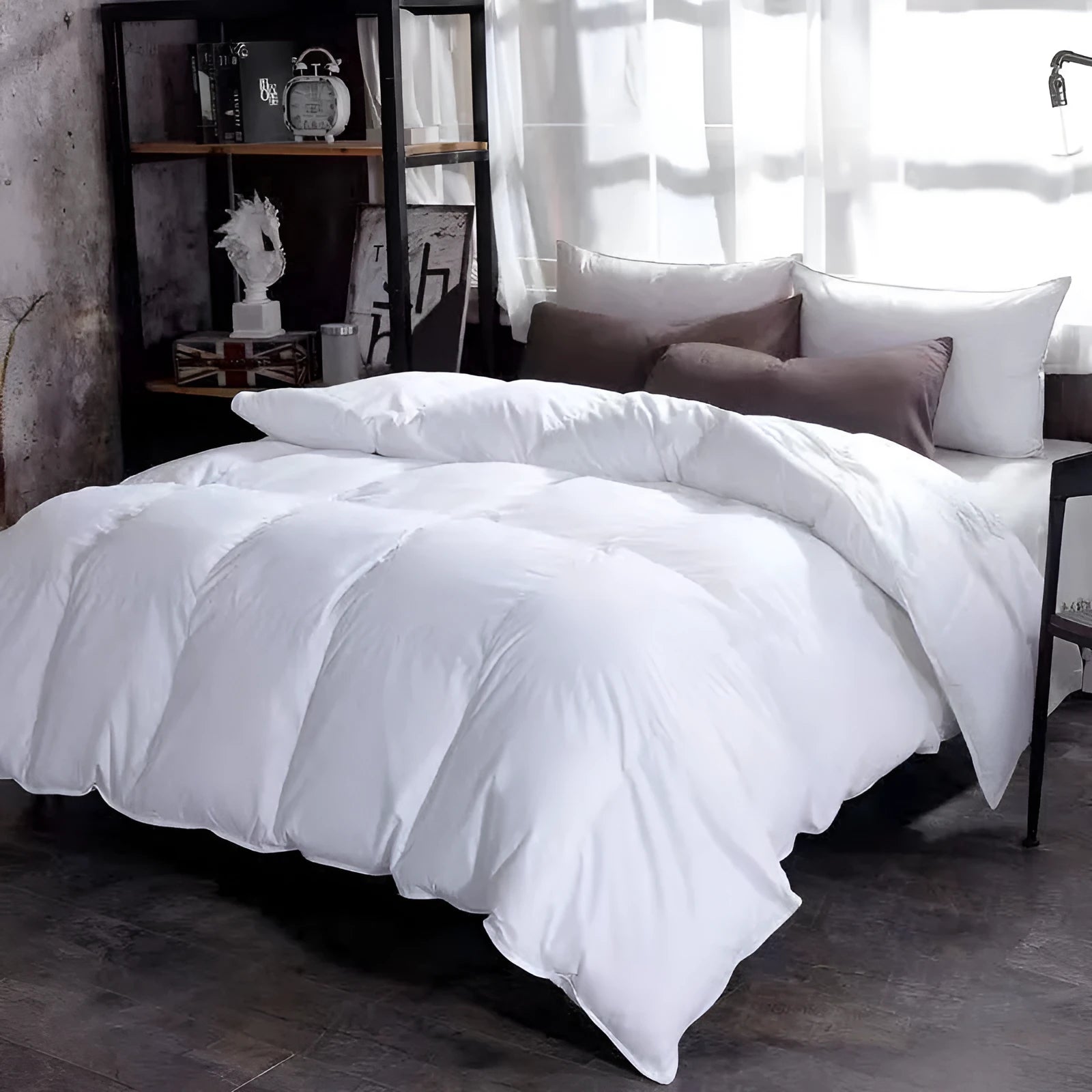 Goose down winter duvet in twill fabric showing colour options on a bed