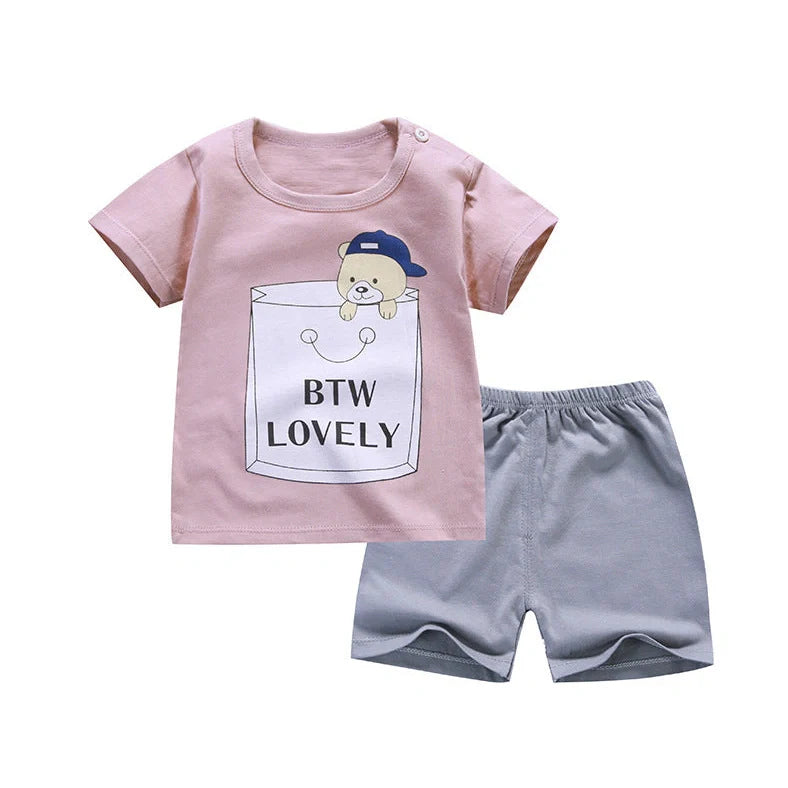 100% cotton Korean-style baby two-piece set with cartoon pattern, short sleeves, and five-point pants