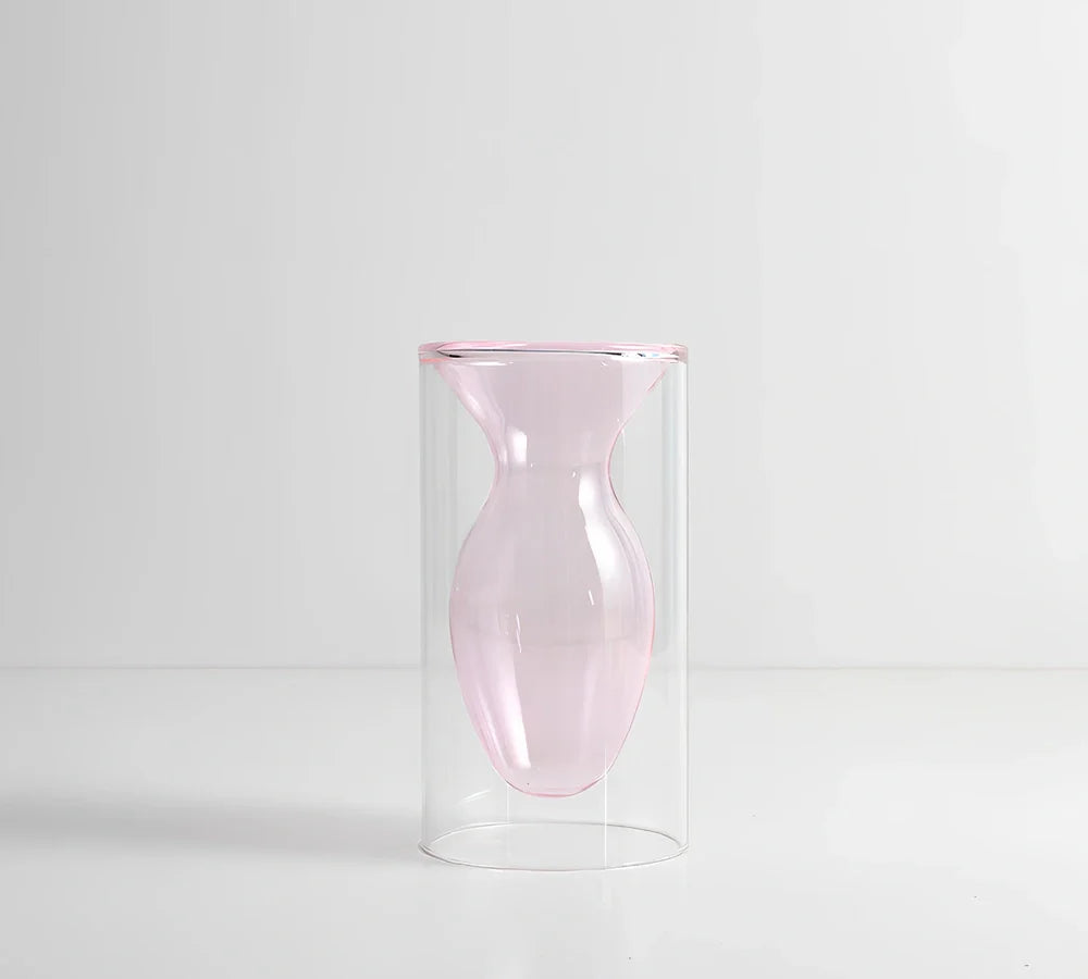 Transparent glass vase with colourful inner layer displaying dried flowers, 15cm tall on wooden table
