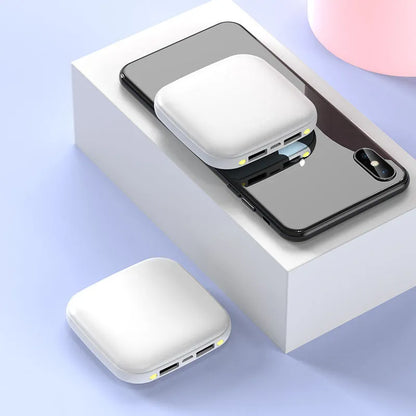 Mini power bank with 20000mAh capacity, compact black design, LED flashlight, and USB port for charging devices