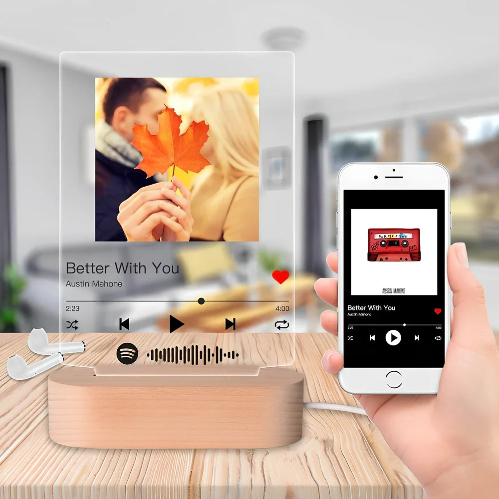 Customisable photo night light with 22x15cm acrylic panel showing engraved song lyrics beside personal photograph