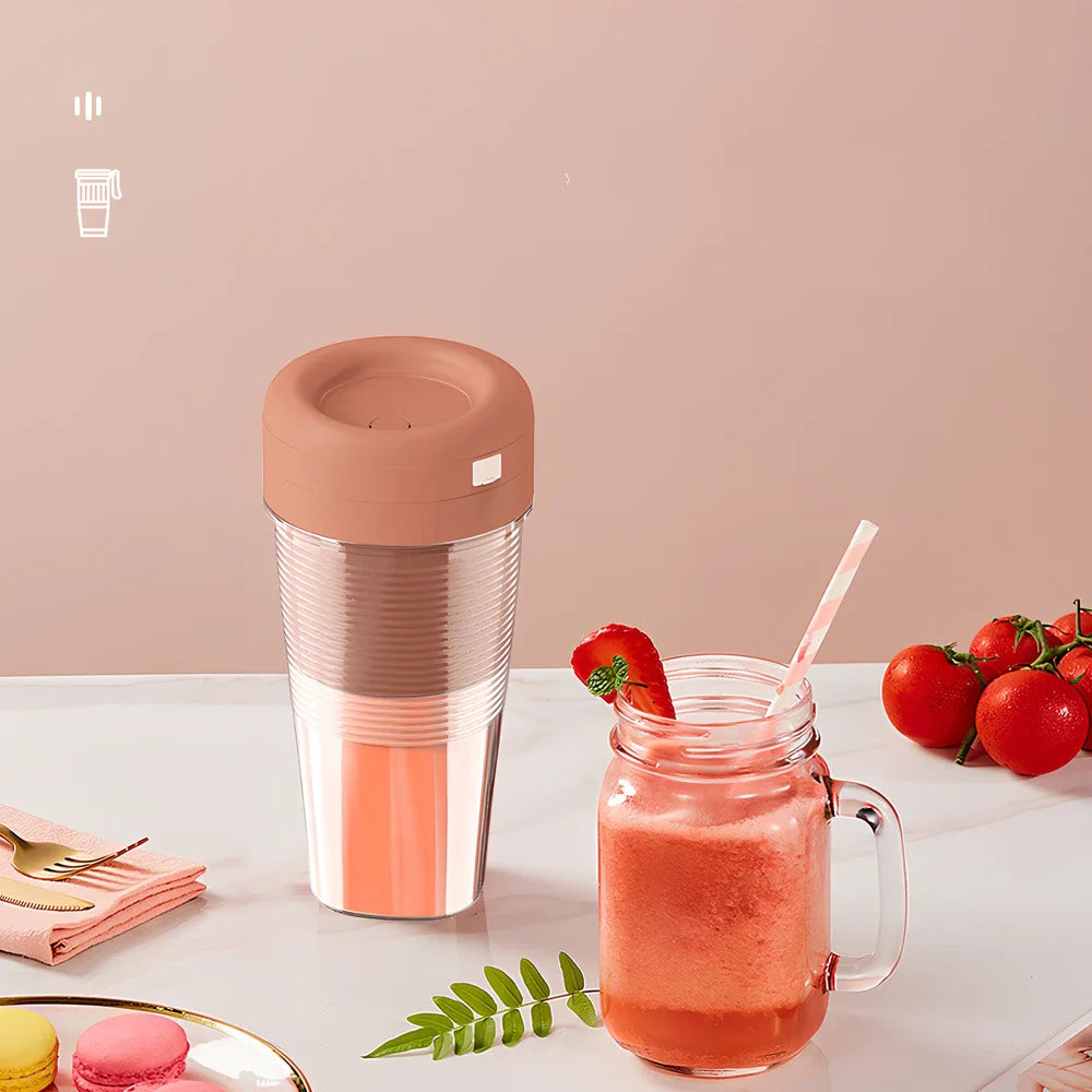 Dark blue USB mini juicer cup with 400mL capacity, four blades, and 185mm height for portable blending