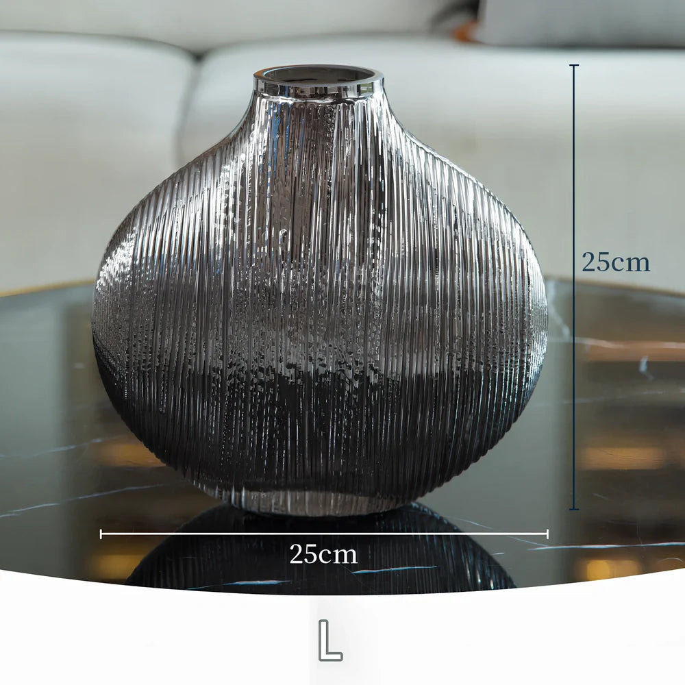 Silver brushed electroplated glass vase showing brushed texture and glass transparency at opening