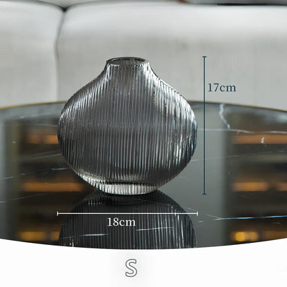 Silver brushed electroplated glass vase showing brushed texture and glass transparency at opening