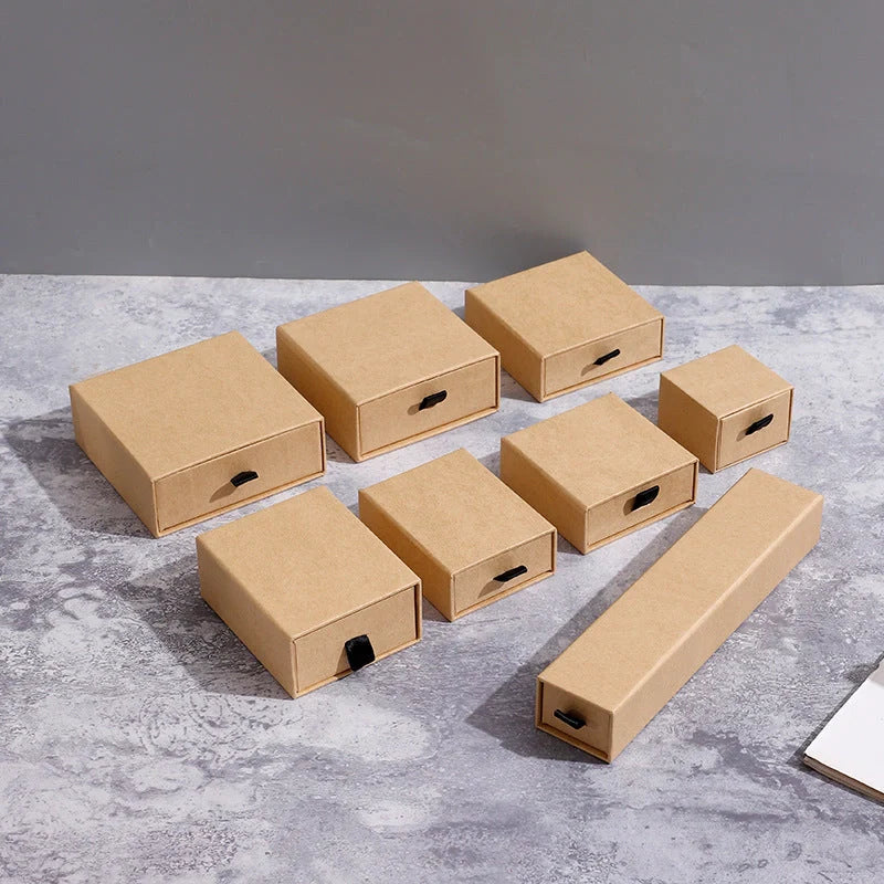 Luxury jewelry storage box with pull-out drawers for necklaces, bracelets, rings, and earrings