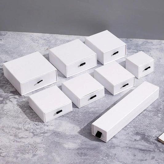 Luxury jewelry storage box with pull-out drawers for necklaces, bracelets, rings, and earrings