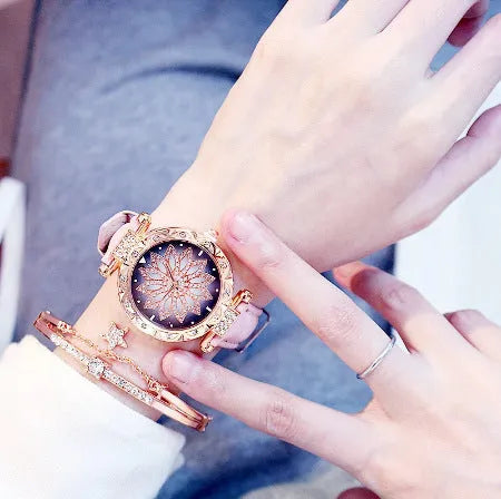 Fashion watch for women with diamond bezel, waterproof to 30 metres, 32mm round dial with mineral glass, pin buckle clasp, available in nine colours including red, purple, and pink.