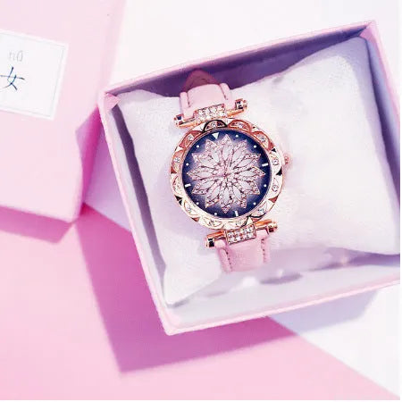 Diamond bezel women's fashion watch with round dial on wrist, showing colour options of red, purple, green, blue, black, pink, beige, grey, and brown.