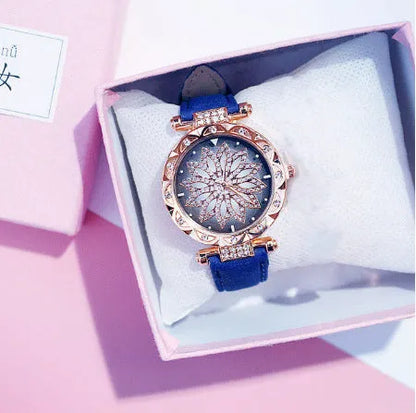 Diamond bezel women's fashion watch with round dial on wrist, showing colour options of red, purple, green, blue, black, pink, beige, grey, and brown.